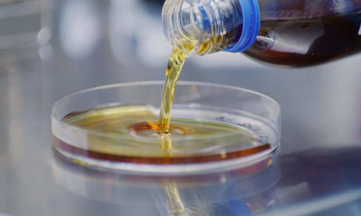 Pouring probiotic sample on a capsule