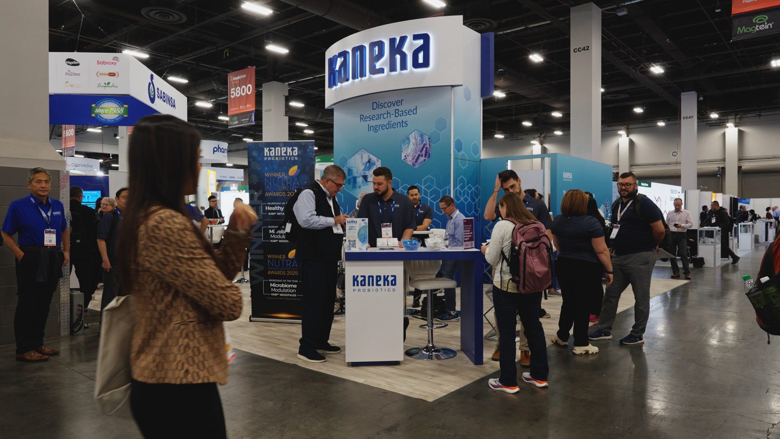 Visitors at the Kaneka Probiotics booth