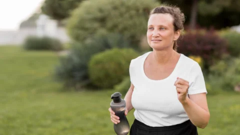 Happy active middle aged woman