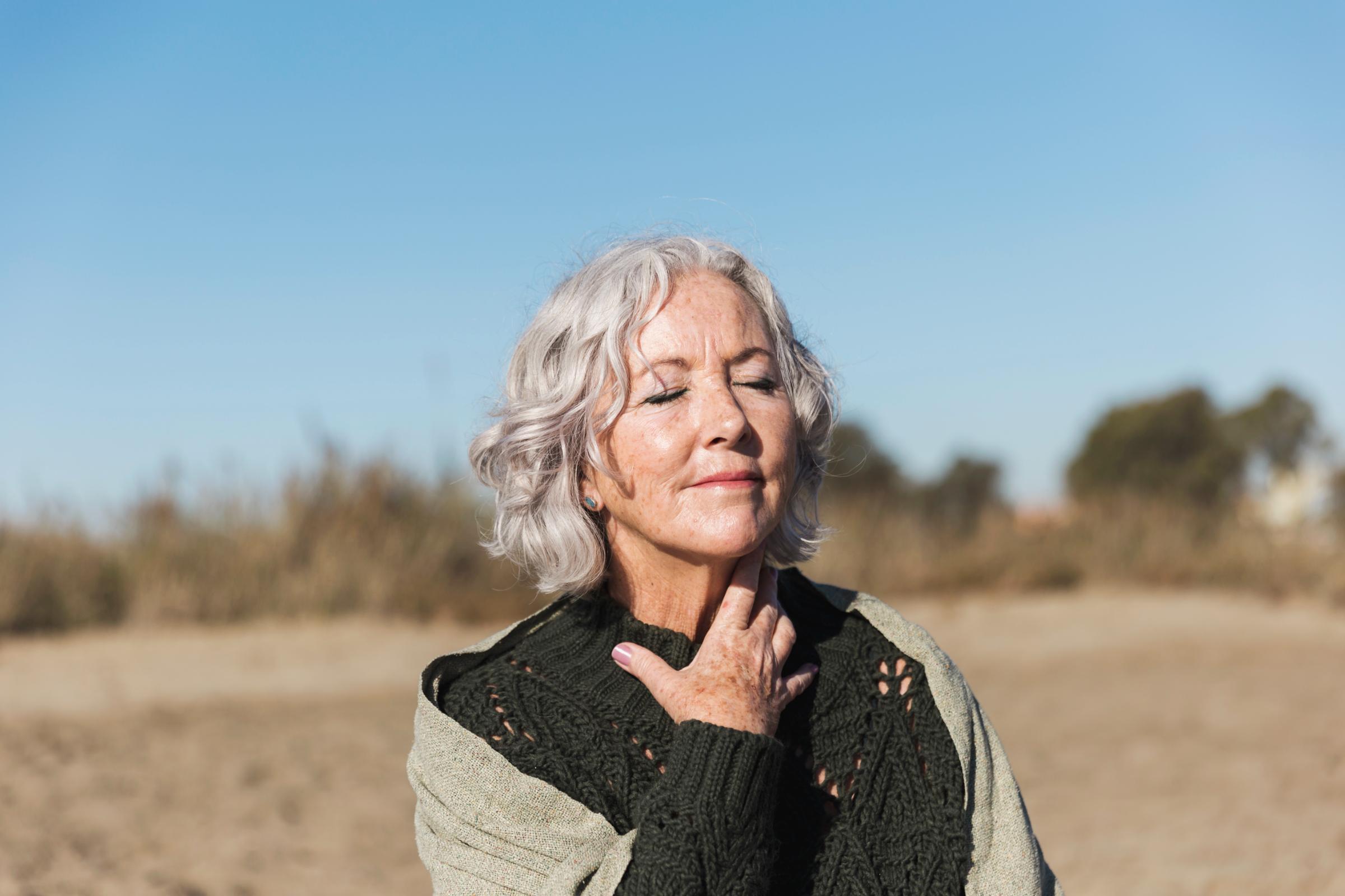Happy woman at the beach