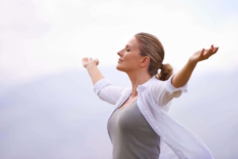 Happy woman with healthy gut