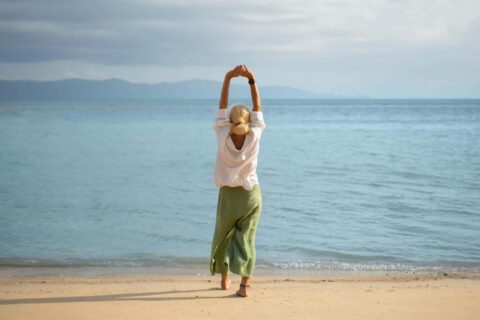 Happy woman at the beach