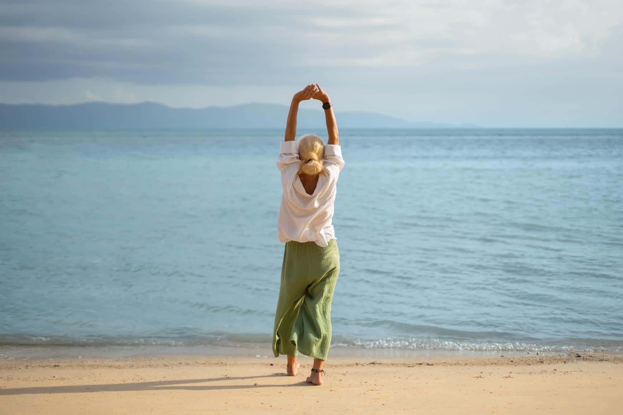 Happy woman at the beach